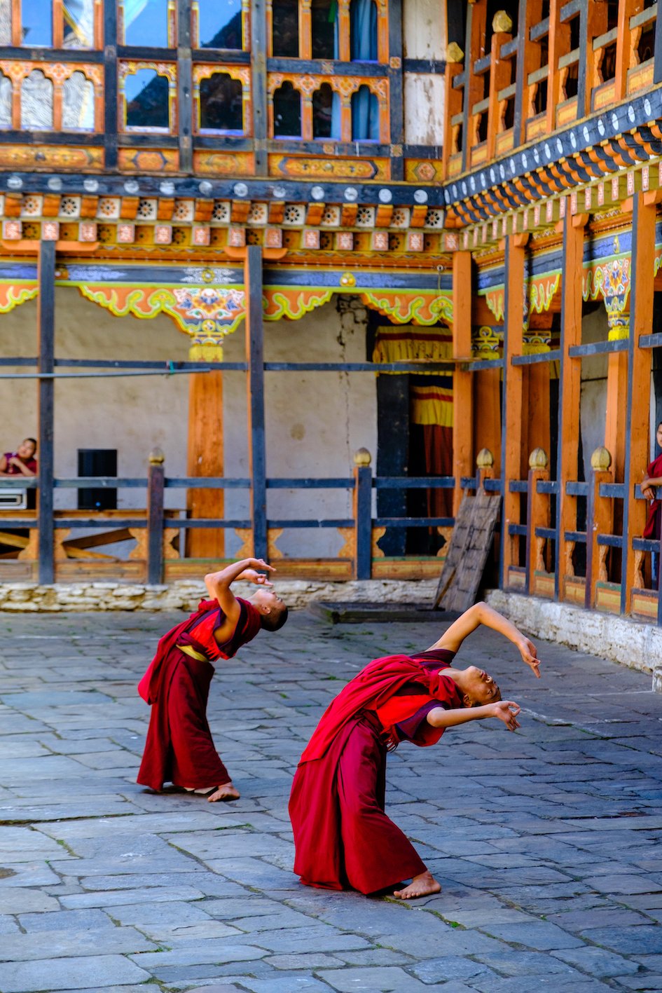 monks in bumthang bhutan