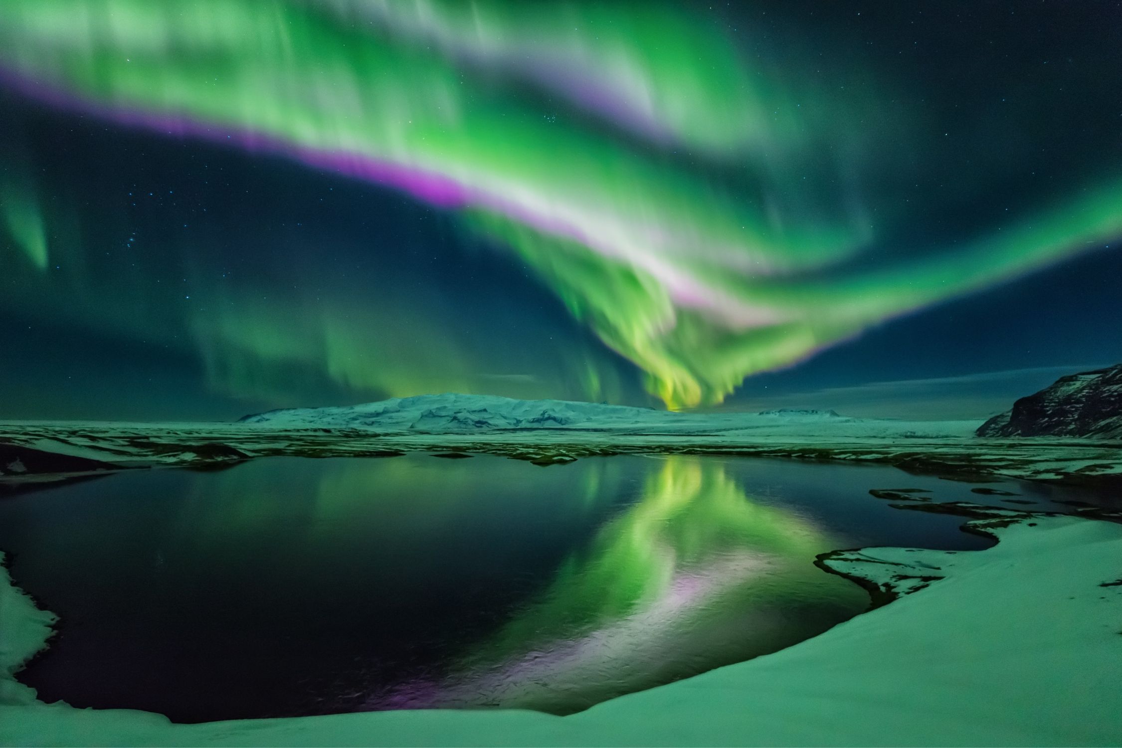 A Vibrant Display Of The Northern Lights In Iceland
