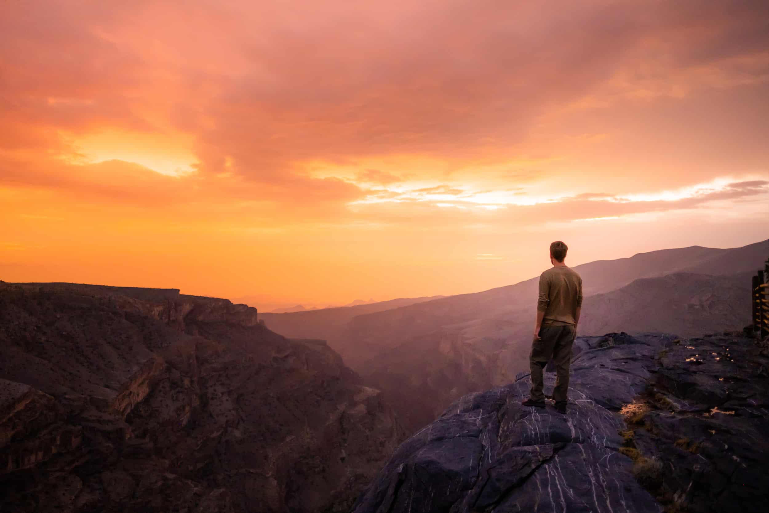 Cameron Watchs A Sunset In Omani Mountains